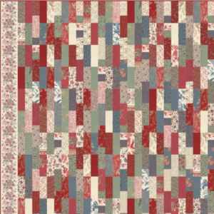 La Belle Fleur free quilt pattern by French General for Moda Fabrics featuring a colorful jelly roll patchwork design in red, blue, sage green, and cream floral fabrics