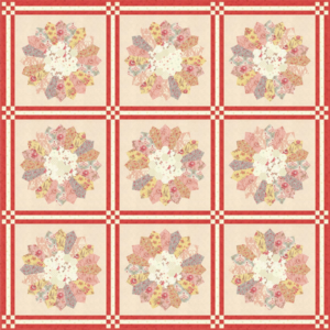 Printemps free quilt pattern by 3 Sisters for Moda Fabrics featuring nine Dresden Plate flower blocks in soft pink, peach, yellow, and aqua floral fabrics with red lattice sashing