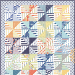 Sunnyside free quilt pattern by Kate Spain for Moda Fabrics featuring colorful pinwheel blocks in blue, aqua, yellow, orange, and navy prints with a coordinating circular print border.