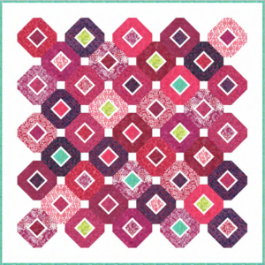 Truffle Fillings free quilt pattern by Moda Fabrics featuring octagonal quilt blocks in pink, raspberry, burgundy, and purple batiks with colorful diamond centers and white background accents.