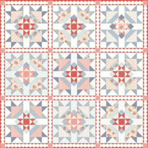 Victoria free quilt pattern by 3 Sisters for Moda Fabrics featuring nine traditional star quilt blocks in soft coral, dusty blue, blush pink, and cream floral fabrics with red and white sashing.